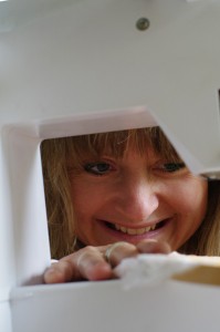 Tessa working at her sewing machine