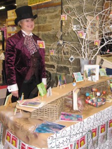 TJ in Dickensian dress, a top hat and tails.